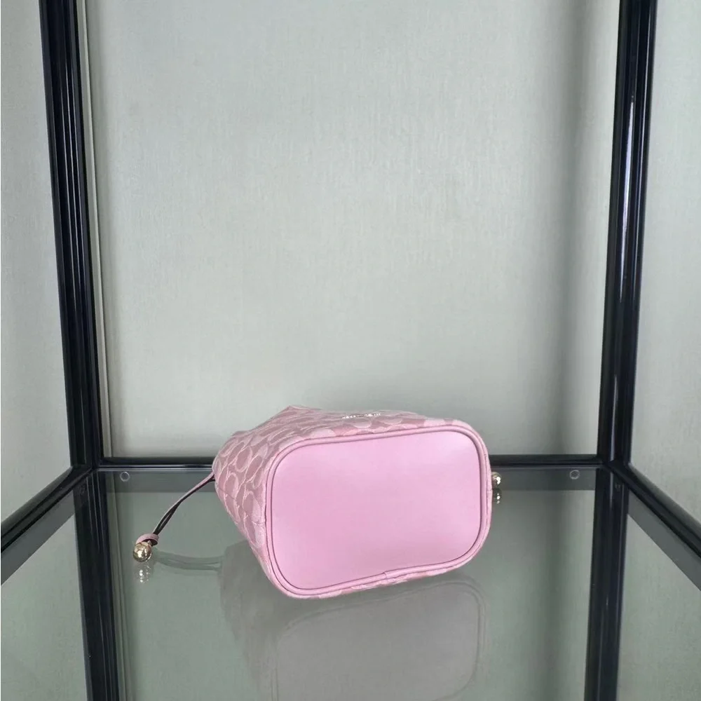 Coach Pink Signature Mini Drawstring Bucket Bag with Gold Chain